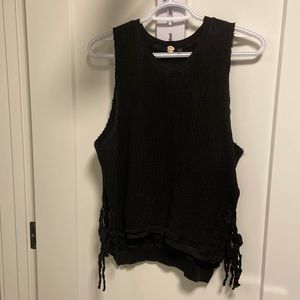 Free people waffle tank. Like new. Size medium. It’s a deep navy/ black